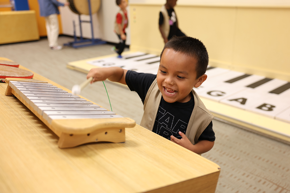 MELA student playing at Mayborn Museum