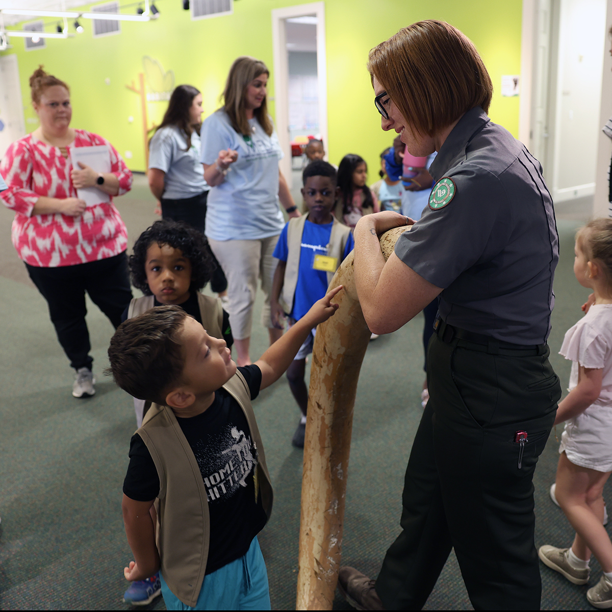 Mammoth Park Ranger showing tusk to MELA students