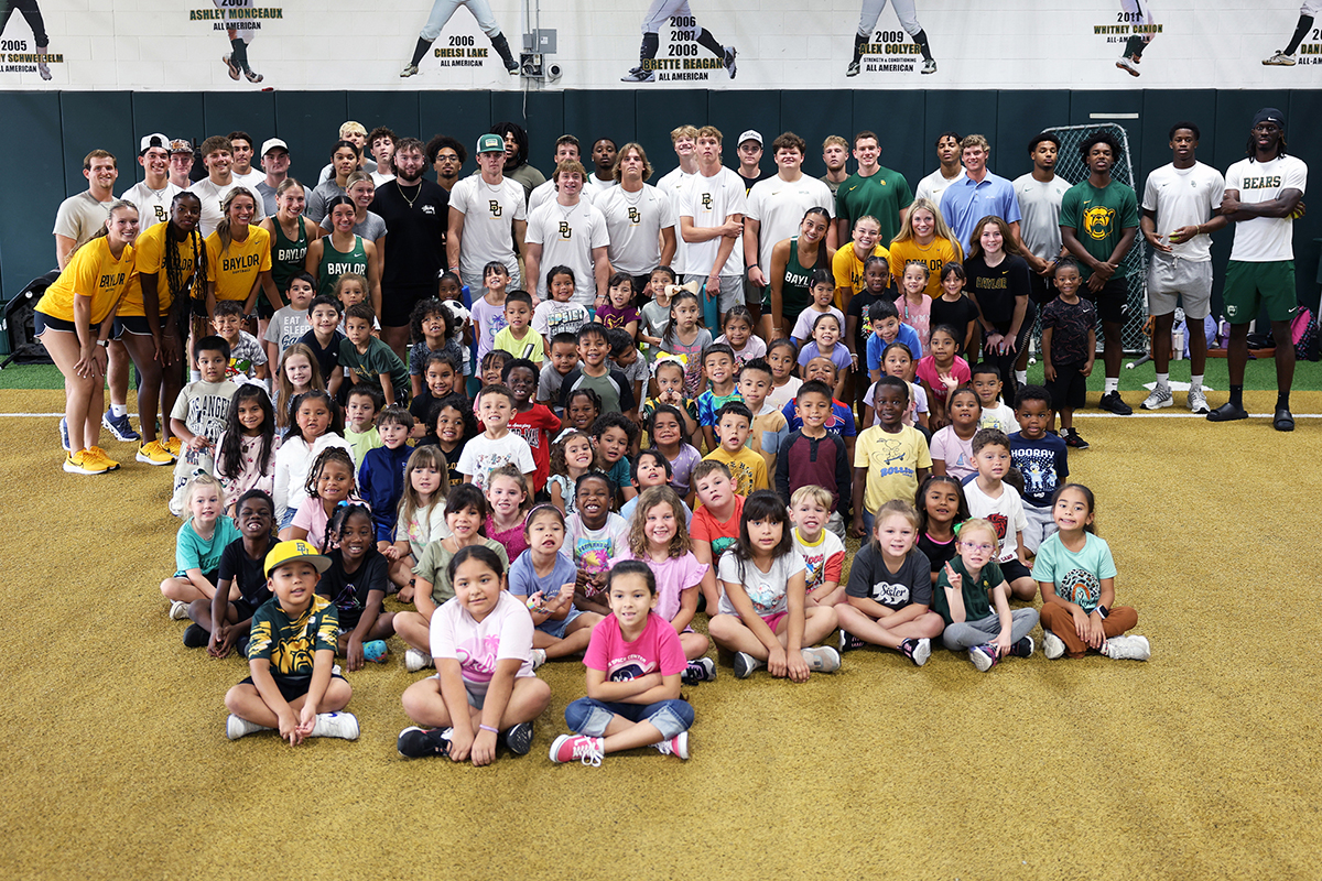 MELA students with Baylor athletes group pic