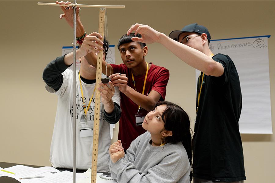 High-school students work in an engineering class in summer camp.