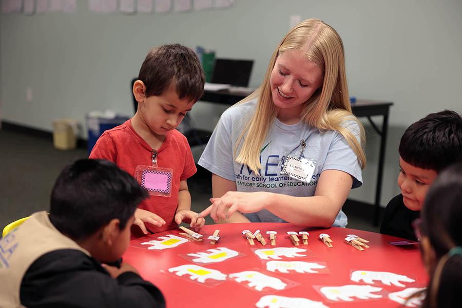School of Education master’s candidate Sarah Bertelson instructs students from Bell’s Hill Elementary in Waco ISD in early math